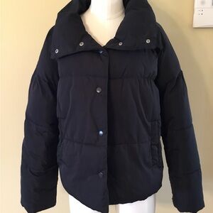 Free People black puffer jacket.